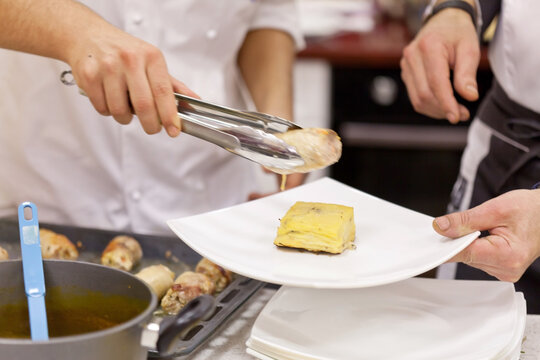 chef at work in restaurant - Powered by Adobe