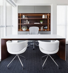 A stunning modern home interior with elegant furnishings, sleek lines, and a minimalist aesthetic. Featuring a spacious layout, natural lighting, and contemporary decor, this stylish living space embo