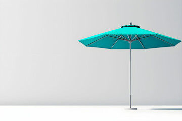 Fototapeta premium Blue umbrella on a minimalist table with a clean gray wall in the background for summer relaxation and leisure concepts
