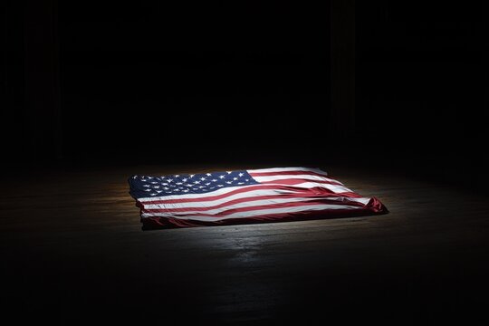 American Flag on Wooden Floor
