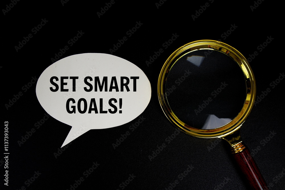 Poster set smart goals text on speech bluble with magnifying glass top view on black background