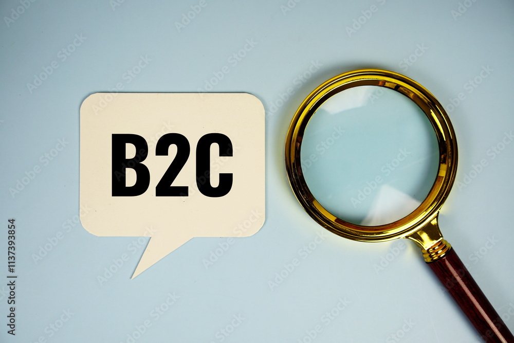 Poster b2c text on speech bubble with magnifying glass top view on blue background
