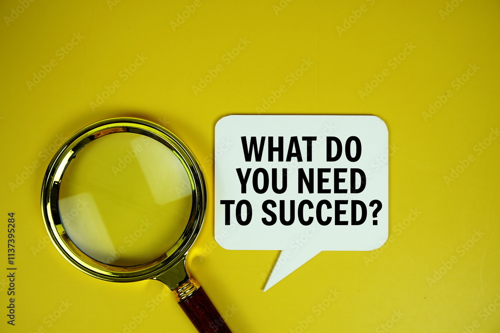 Poster what do you need to succed? text on speech bluble with magnifying glass top view on yellow backgroun