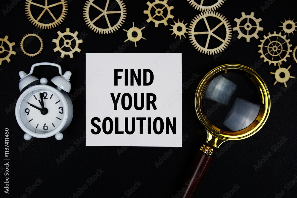 Poster fys - find your solution text message on sticky note with magnifying glass and alarm clock on black 