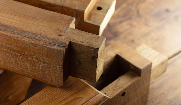 Mortise, tenon joints of antique rustic furniture. VIntage teak furniture.