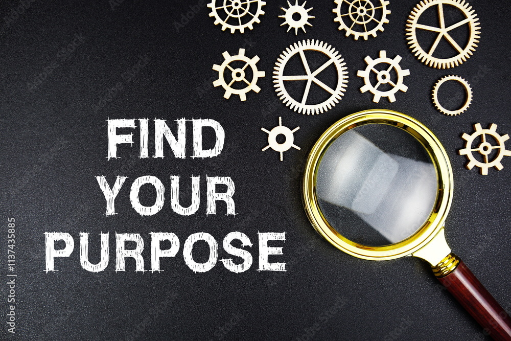 Poster find your purpose text message with magnifying glass on black background