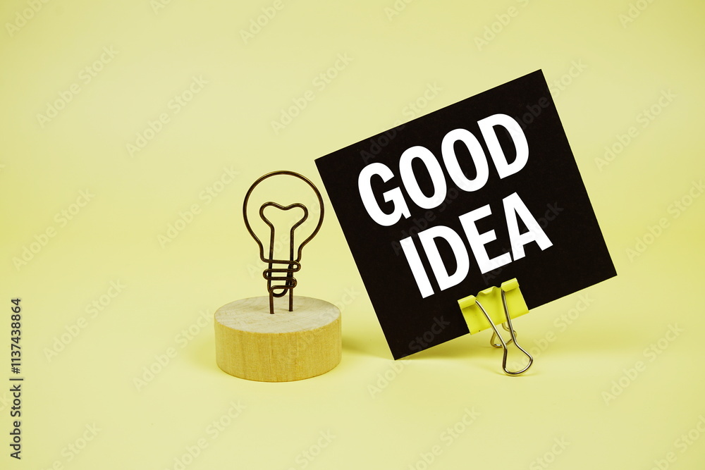 Poster good idea text message on sticky note with on yellow background
