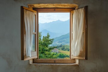 A scenic view through an open window showcasing mountains and greenery.