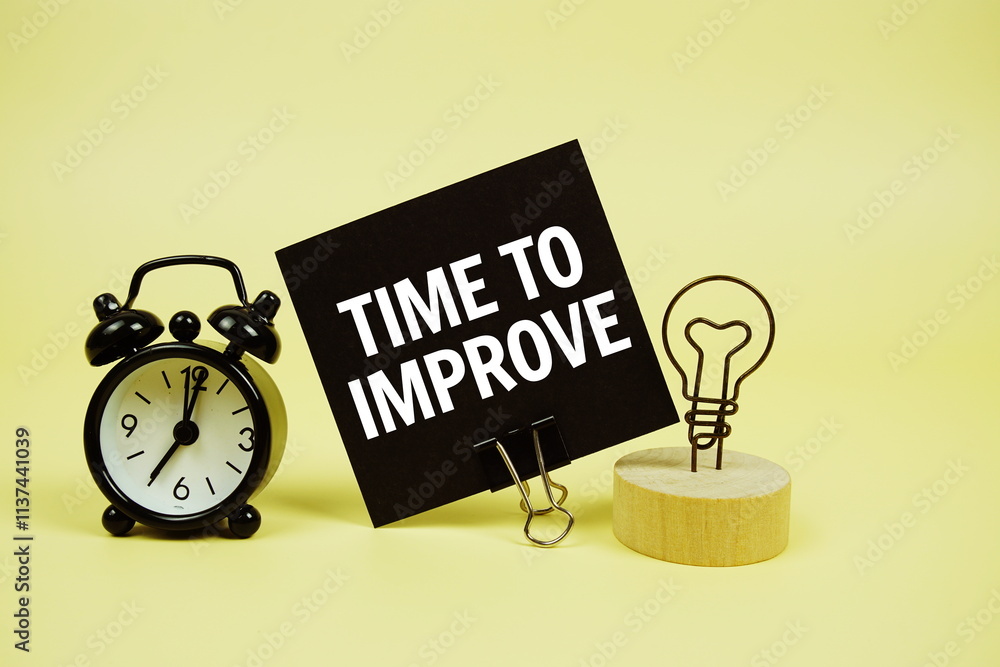 Poster time to improve text message on paper card with alarm clcok on yellow background