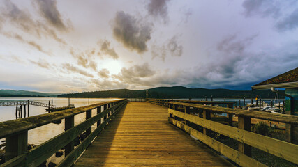A cloudy new Spring Day dawning over a pier at Sooke Harbor, BC.