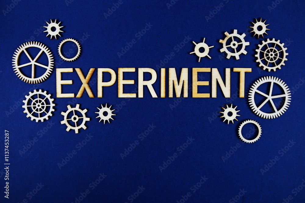 Poster experiment alphabet letters with gears element on navy blue background