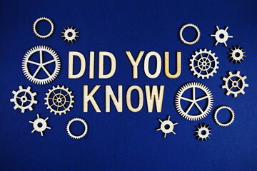 Did You Know alphabet letters with gears element on navy blue background