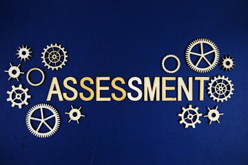 Assessment alphabet letters with gears element on navy blue background