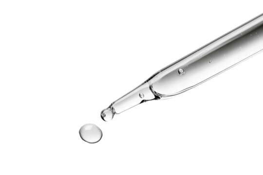 Close up clear glass dropper with liquid droplet falling isolated on background.