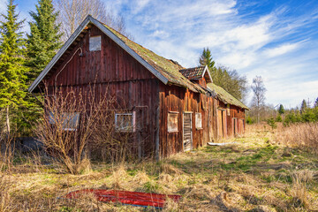 Old abandoned wooden barn in the countryside