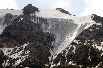 Glacier in the mountains at the foot of Lenin Peak in the Pamir Mountains in Kyrgyzstan