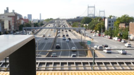 Triborough Bridge in Astoria, Robert F. Kennedy Bridge, New York City. Car traffic on road, multiple lane transport highway from elevated subway station in Queens near Ditmars Steinway, NYC, USA.