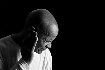 suffering from deafness and hearing loss on grey background with people stock image stock photo	
