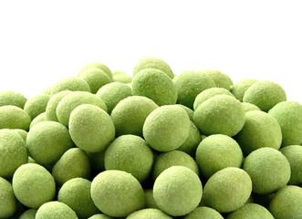 Pile of whole  wasabi coated peanuts isolated on white.