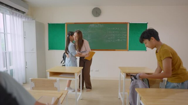 Young student leave classroom after finished study in elementary school. 