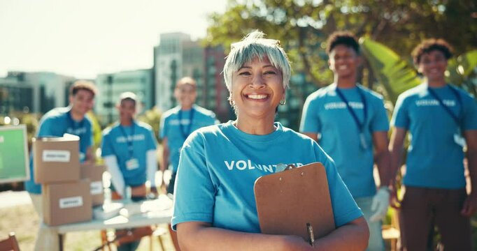 Face, group and woman with clipboard, volunteering and teamwork for charity project. Portrait, people and senior person with documents, food donations or unity for non profit, NGO foundation or smile