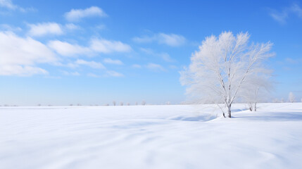 Obraz premium Snowy Winter Landscape with Blue Sky and Clouds