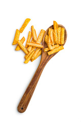 Rolled nachos tortilla chips on spoon isolated on white background.