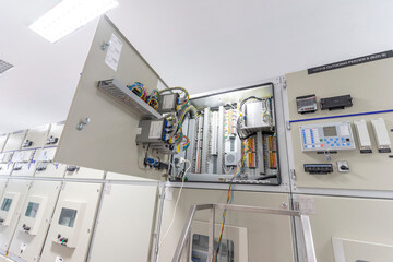 Interior of electrical room. Main operator station network and circuit center in industry factory manufacturing system.