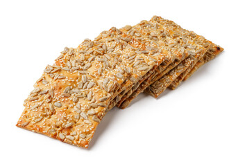 Delicious homemade seed crackers arranged on a white background ready for snacking or serving at gatherings