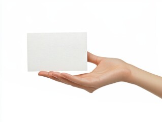 Obraz premium Hand holding textured white card studio setting product display minimalist environment close-up view design concept showcase