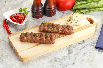Kebab with beef served onion