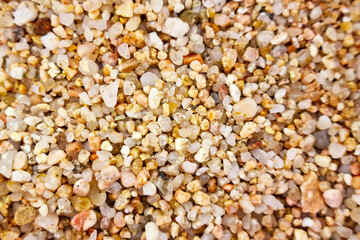 Close-Up of Colorful Pebbles and Sand Texture for Nature Background Design