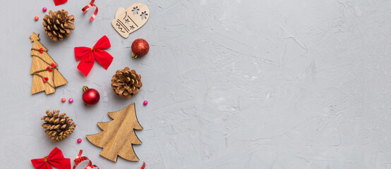 New Year composition. Christmas decor background with pine cones. Top view with copy space