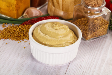 Dijon mustard sauce in the bowl