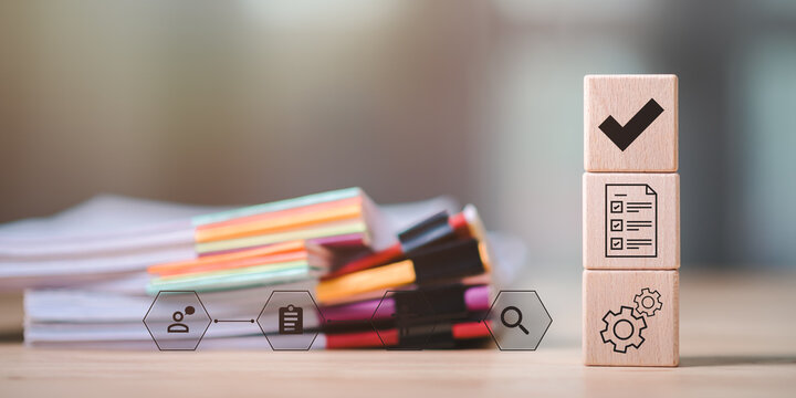 Accountant showing office document auditing concept ,plan review process and assess correctness ,Management of important document storage of organization ,document system ,accountant Audit documents.