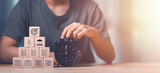 Businessman showing virtual icon , time management concept ,effective business planning ,time management in the organization ,Agreement and solution ,appointment punctuality