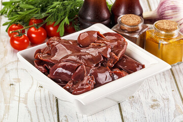 Raw chicken liver uncooked in the bowl