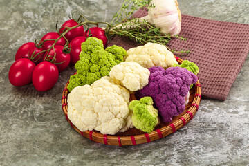 Raw cauliflower different colors heap