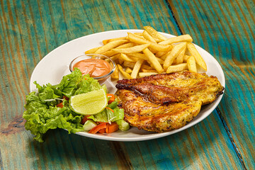 Grilled chicken fillet with french fried potato