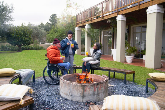 Friends around fire pit