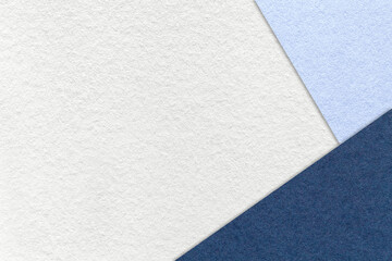 Texture of craft white color paper background with sky and and navy blue border. Vintage abstract denim cardboard.