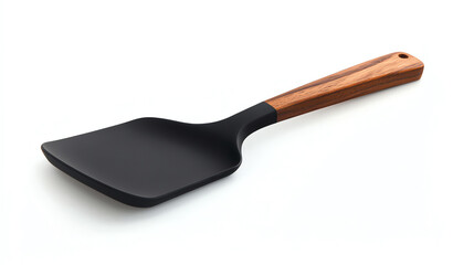 Black spatula with wooden handle on white background