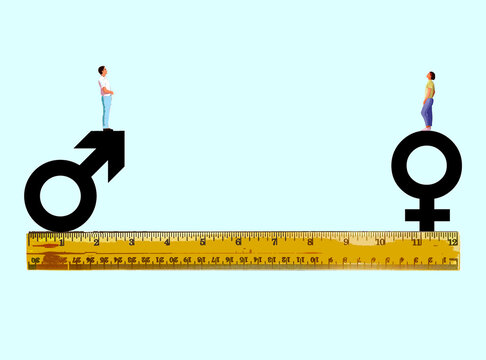 Man and woman standing on gender symbols over ruler