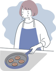 料理中に涙を流す女性のイラスト素材