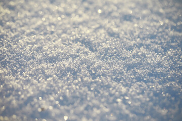 Close-Up of Sparkling Snow Texture in Sunlight - Winter Wonderland Background