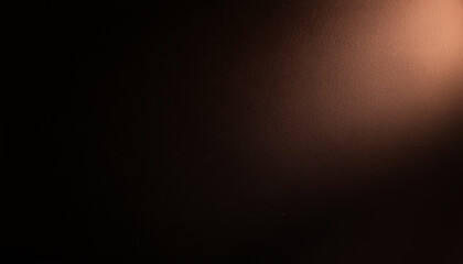 Obraz premium 2025 year color. Defocused mocha mousse radiance soft texture color on dark black abstract empty space background.