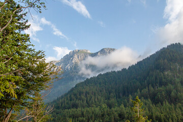 Mountains with clouds in southern Bavaria. Blue sky