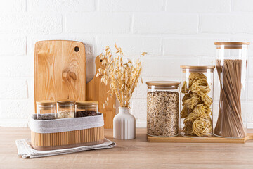 Modern kitchen counter with stylish wooden accessories