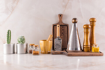 Elegant kitchen accessories on marble countertop