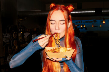 Enjoying Asian Street Food at a Bustling Night Market